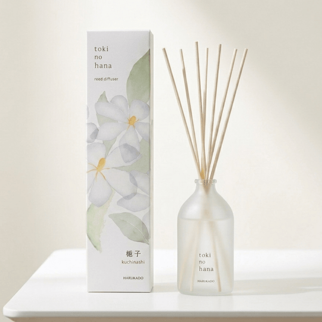 Reed diffuser set with packaging labeled 'toki no hana' on a light surface.