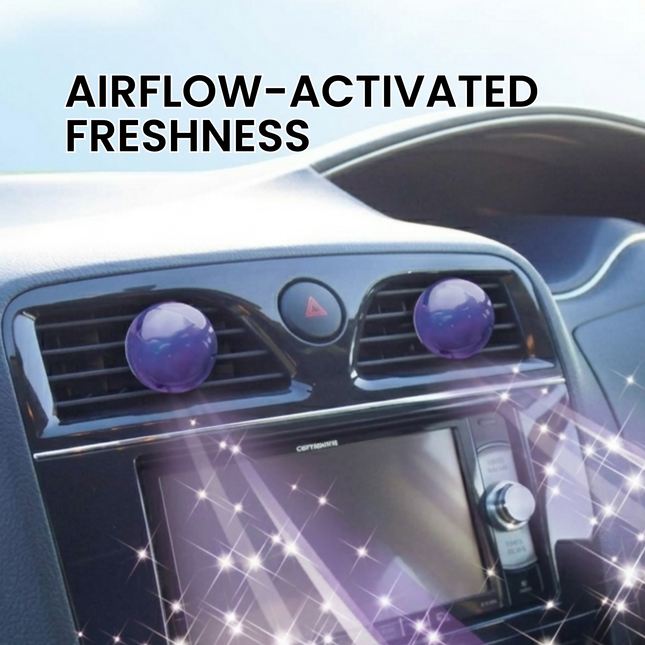 Car air freshener with 'AIRFLOW-ACTIVATED FRESHNESS' text on a blurred car interior background.