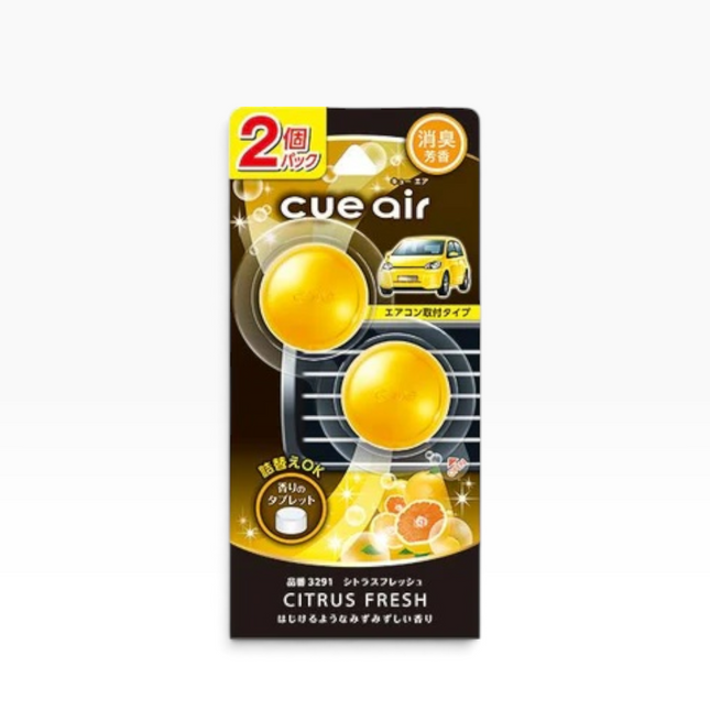 Cue Air Citrus Fresh air freshener package containing two round yellow gel packets, shown on a plain white background.