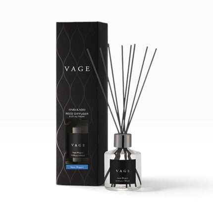 VAGE reed diffuser set with a clear glass bottle, black reeds, and a black patterned retail box on a clean white background.