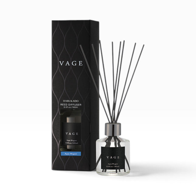 VAGE reed diffuser set with a clear glass bottle, black reeds, and a black patterned retail box on a clean white background.