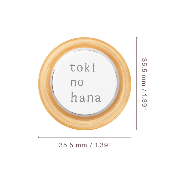 Circular wooden frame with 'toki no hana' text on a white background