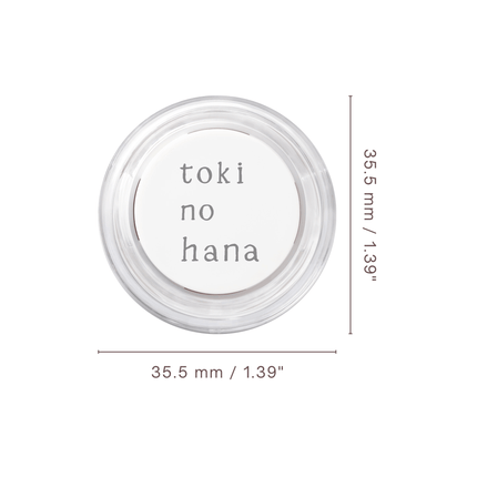 Small round container with 'toki no hana' text on a white background