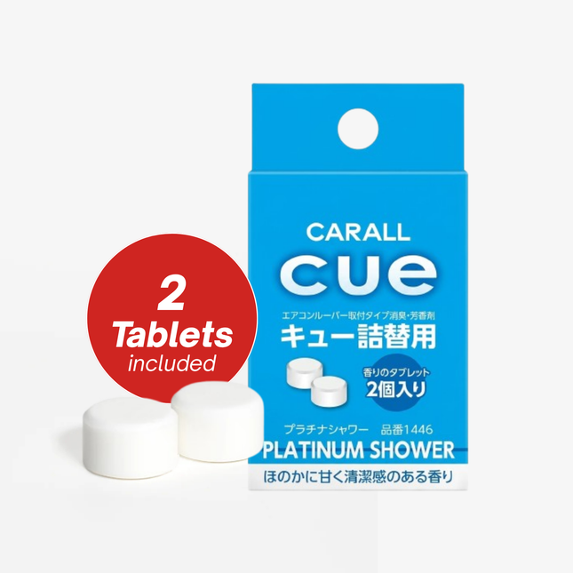 Carall Cue shower tablet packaging with two tablets on a white background