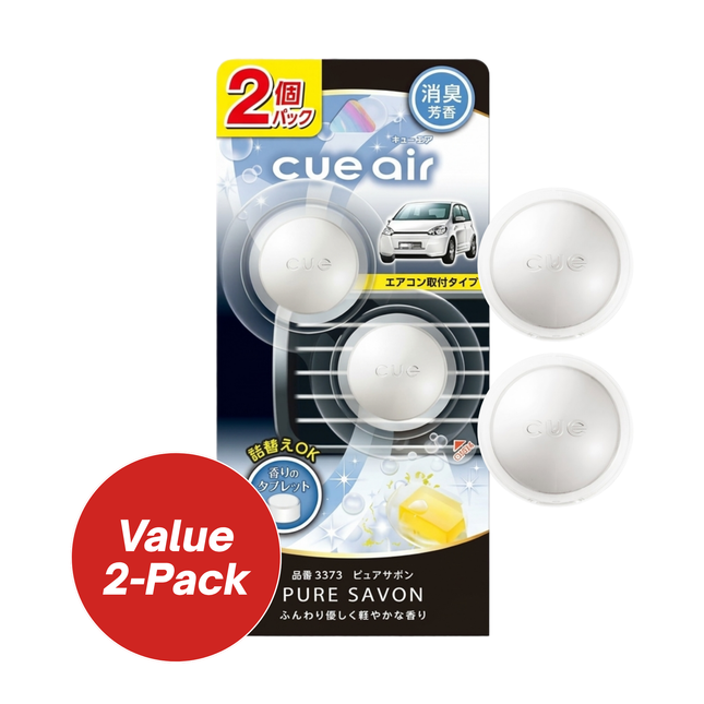 Cue Air car air freshener packaging with two white spheres and a car illustration on a white background.