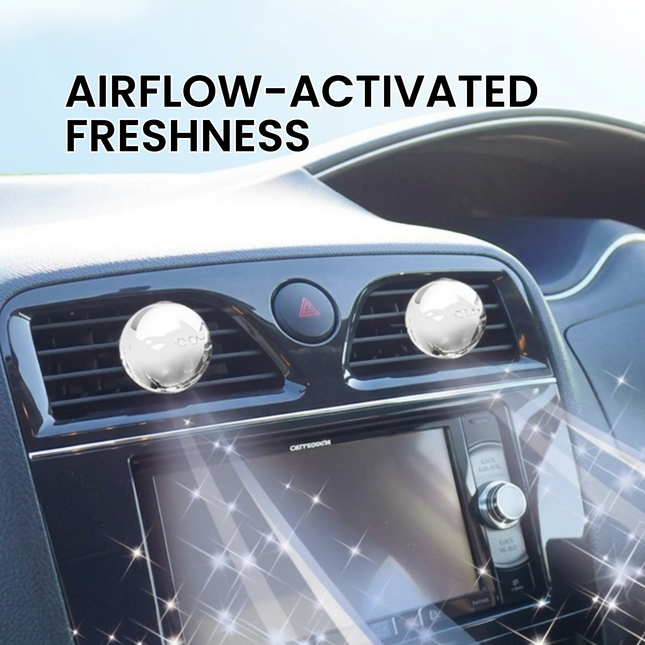 Car air freshener with 'AIRFLOW-ACTIVATED FRESHNESS' text on a car dashboard.